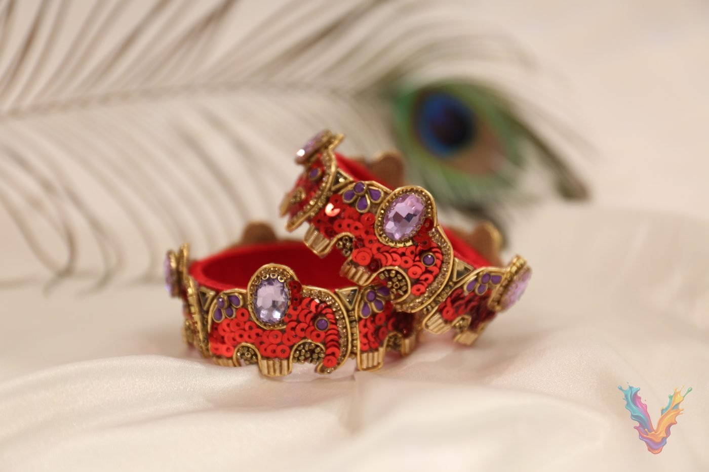 A row of pastel sequin bangles with pink and blue stones