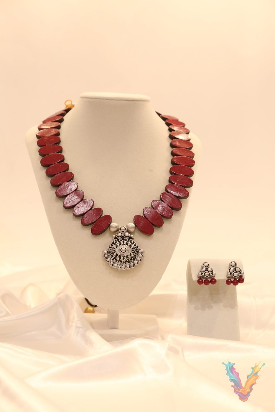 Pink and gold terracotta necklace with a pendant and earrings
